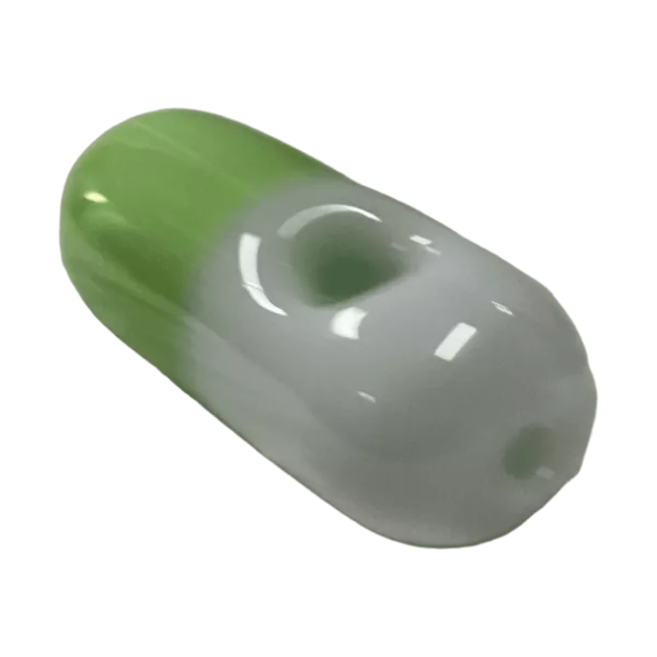 A green and white, elongated pill with Lil Pill written in white on a smoking company website.