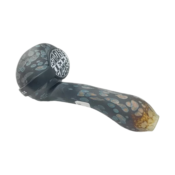 Handcrafted glass pipe with colorful, irregularly shaped holes. Small, round base and curved design for comfortable hold. Thin, tapered stem.