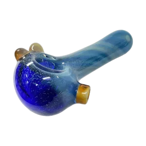 Swirled blue glass pipe with wooden handle and gold accents on Flavour Town Glass. Green background.