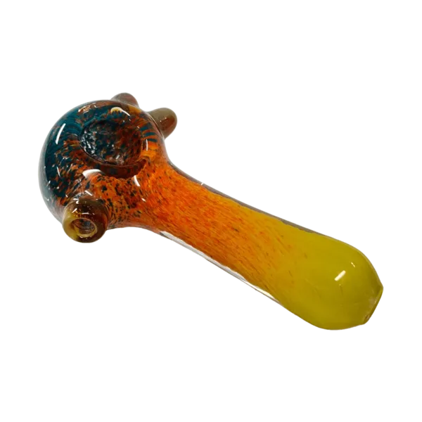 Colorful glass pipe with intricate design, featuring a transparent body with swirls and a brown/yellow base. Small bowl and hole at the top. Made by Flavour Town Glass.