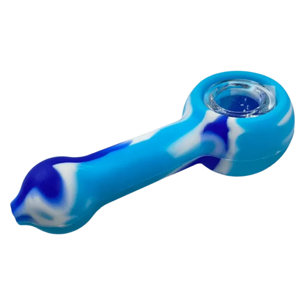 Blue and white marbled glass pipe with small hole, sitting on green surface. Made of silicone.