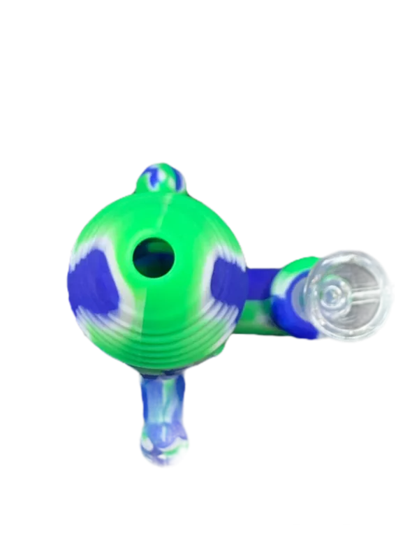 Blue and green silicone smoking pipe with a cylindrical shape and small, rounded hole at the top. Displayed on black background.