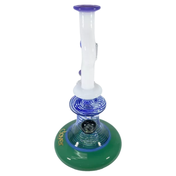 A clear glass bong with a wooden base and a blue and green stem, featuring a small tube with a hole and a bubble-shaped bowl. Also includes a wooden stick for holding the bong in place.