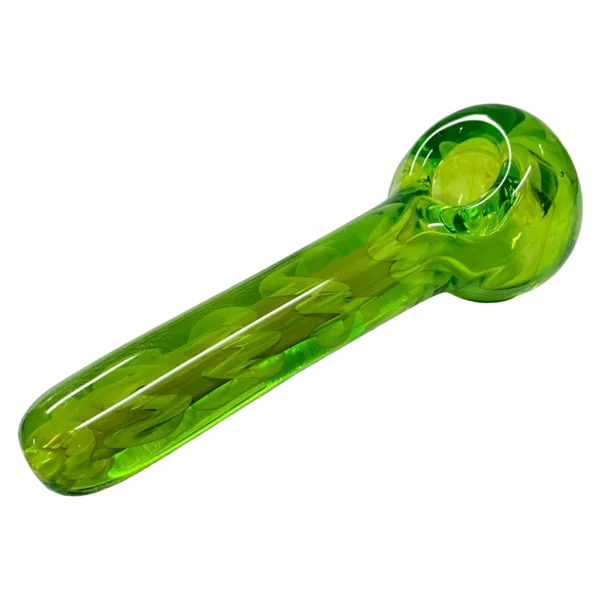Shiny, transparent multiverse glass spoon with a green, swirly, inside-out design and a small, round bowl for serving lime juice.