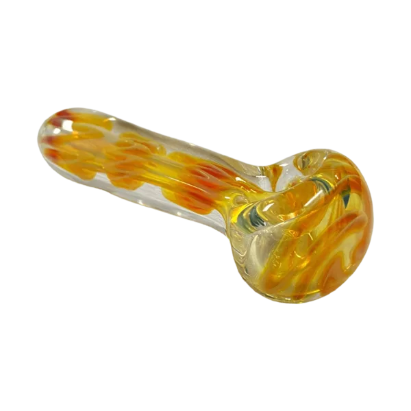 Swirling, abstract pattern with circular designs on clear glass pipe with small spoon bowl and additional tube. Multiverse Glass.