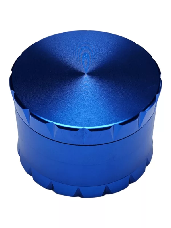 Blue metal container with round shape and flat top, used for storing or transporting small objects. Shiny and smooth surface, not transparent. Not open or attached to anything else.
