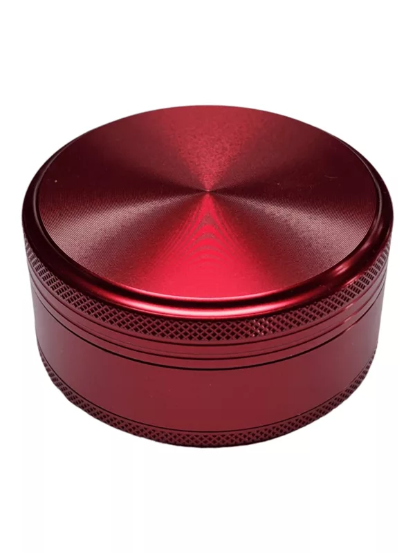 smoking accessory with a sturdy metal construction, featuring a circular design with a flat base and a conical grinder. It is available in a variety of colors and sizes.