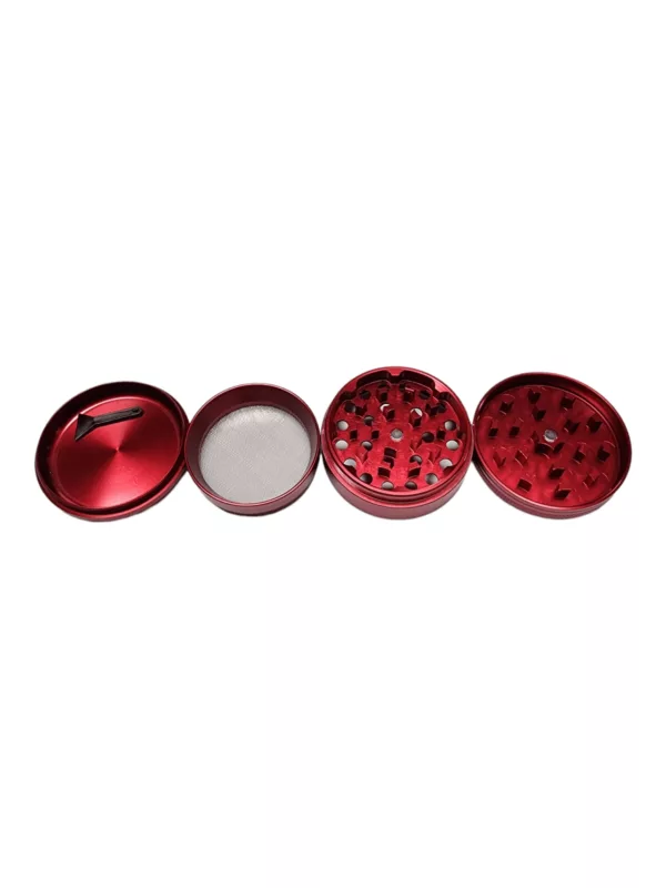 Red metal grinder with two silver circles, handle on top. BVGA006.