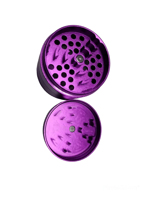 Stylish purple grinder with 6 perforated circles and a star-shaped center. Durable metal or plastic construction with a grooved texture.