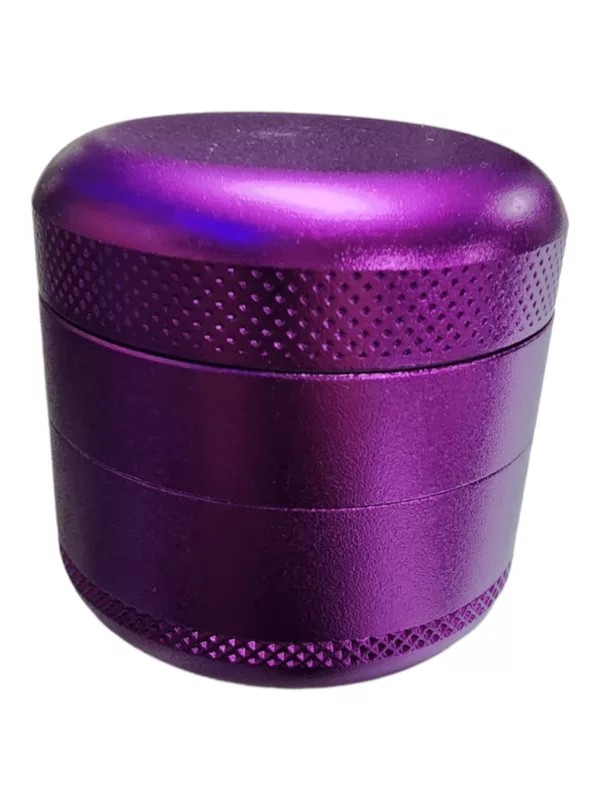 Stainless steel grinder with purple exterior, removable top and side hinge.