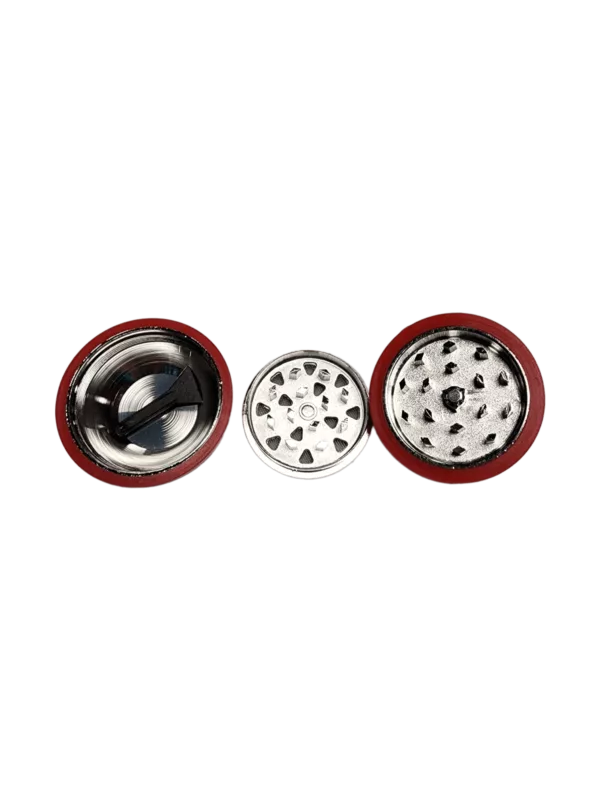 Stylish grinder with stainless steel lid and red/black body. Features sharp blades and convenient handle for easy use.