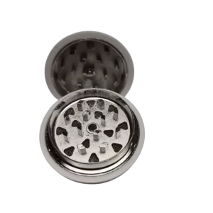 Circular metal grinder with handle and small opening for herbs or spices. Bright, vivid colors. Designed for grinding herbs and spices.