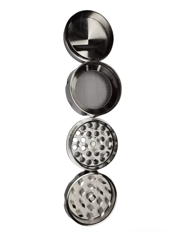 Stainless steel grinder with 3 evenly spaced holes, designed for fine herb and spice powder. Perfect for herbal teas and preparations.