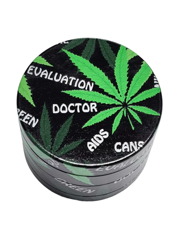 round, black container with a green marijuana leaf on the front and the words evaluation written in green letters.
