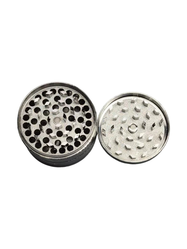 circular, stainless steel grinder with a small hole in the center for holding and grinding ingredients. It is of high quality and suitable for various culinary applications.