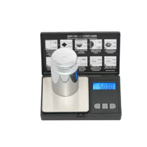 Compact digital scale with stainless steel container for weighing small objects. Displays weight in grams and ounces, with tare function.