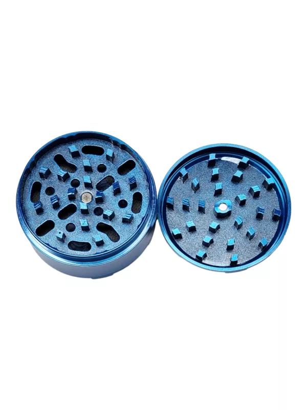 Blue metal grinder with circular shape and holes on surface, purpose unclear but could be used for grinding or cutting.