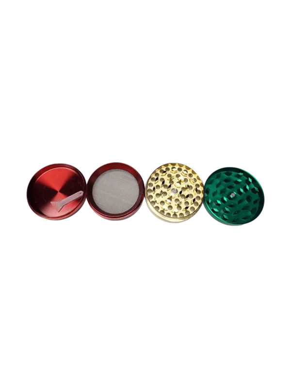 Red, green, yellow, and black cylindrical grinder plates with wood-like texture and smoke hole.