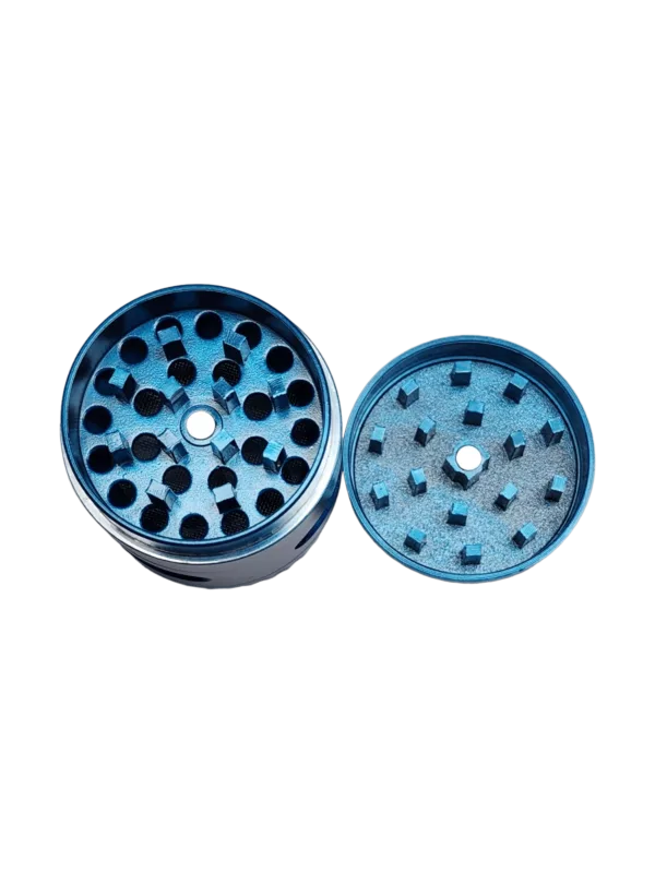 Metal 4-tier herb/tobacco grinder with blue/black finish and grooved teeth for efficient grinding.