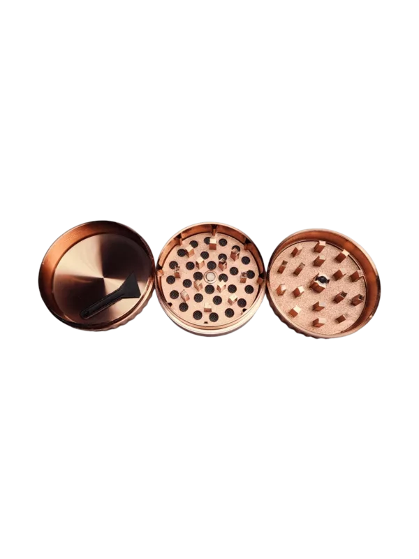 Grind and store your herbs in style with our R&M 3 part Copper Grinder. Made of polished copper, it features three pots with handles and a green background.