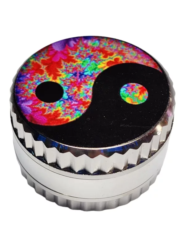 Vibrant, psychedelic grinder with clear plastic body, black base, and silver ring. Features yellow and purple circle on top and Ling Ling written in black font on side.