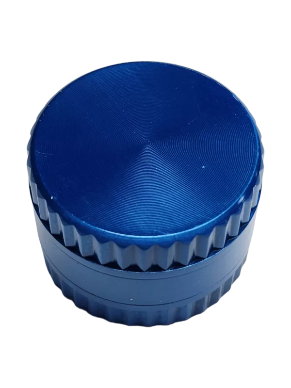 Blue plastic container with round shape and flat top. Smooth surface, likely used for storing or transporting small objects.