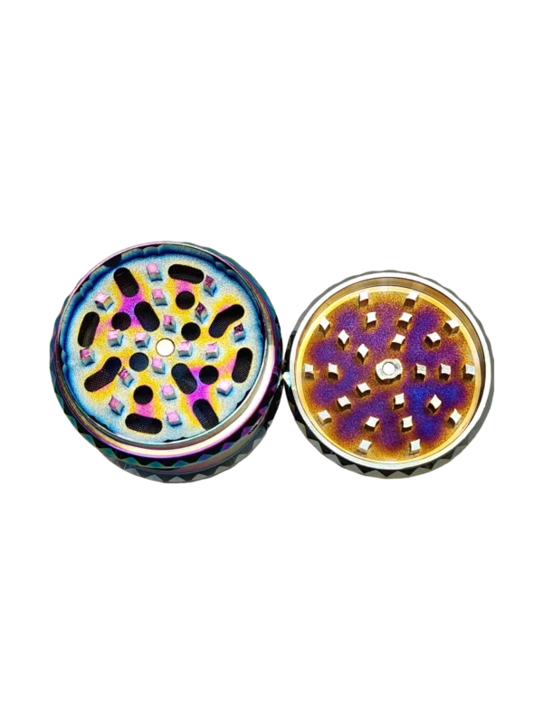 Pair of colorful, metallic circular objects with a hole in the center. Shiny, reflective material. Symmetrical design. Black background.