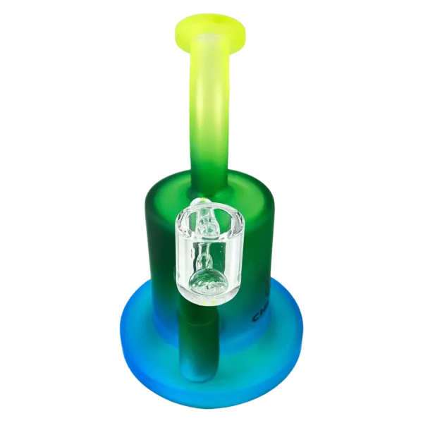 Blue and green glass water pipe with transparent base and colorful, intricate etchings on the stem. Smoke passes through the center hole.