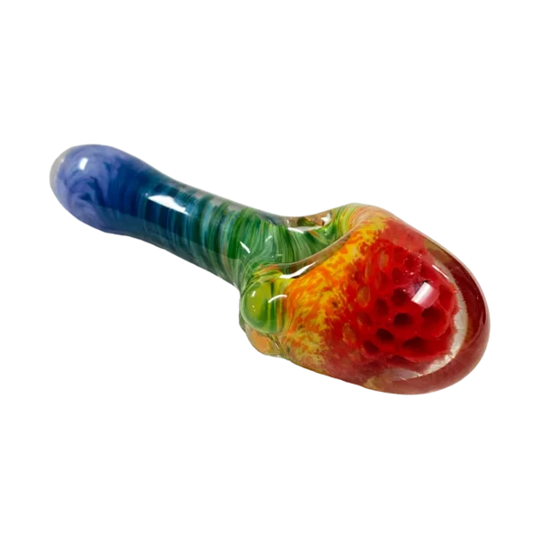 Handcrafted honeycomb glass piece with vibrant red, orange, and yellow swirls, featuring a clear stem and small round base.