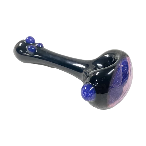 Glass pipe with dark matte finish, purple accents, small smooth bowl, and tapered stem. Base slightly flared.