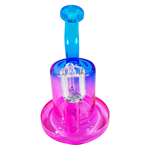 Glass gradient rig with purple, blue, and pink pattern, clear dome and metal ring with blue crystal. Smoke billows from top.