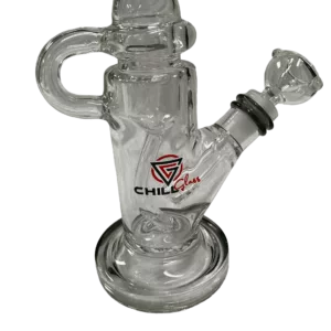 Unique glass bong with red & black turtle design, holding a pipe & featuring a small red bowl with black lines & a hole at the bottom.