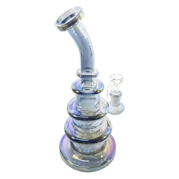 Hand blown glass water pipe in the shape of a wedding cake with intricate details and a polished interior. Tapered base with a small hole. Made of glass.