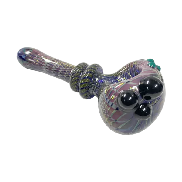 Hand pipe made from glass with twisted purple and blue design, clear bowl with large center hole and blue/purple swirls, clear stem with swirl decorations, small purple mouthpiece.