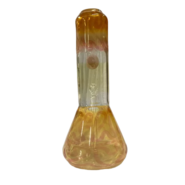 Chubby Tube with Gold Fumed in brown color, transparent casing, sitting on green background.