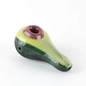 Avocado-shaped glass pipe with green/brown glaze, pink stem, purple bowl, unique design for tobacco use. A great addition to any collection.