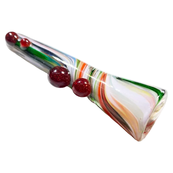 Eye-catching glass chillum with swirled design on outside and inside, featuring red and white marble and small bowl and hole. Decorated with shades of red, white, and green.