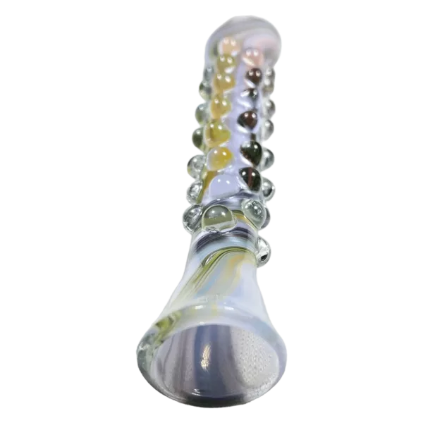 Clear glass pipe with small circular mouthpiece and base, sitting on green background - Groovie Onies - Jem Glass.