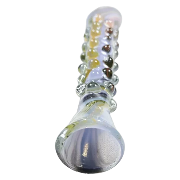 Clear Glass Groovie Onies - Jem Glass Pipe. Cylindrical shape, small circular base and hole. Green background.