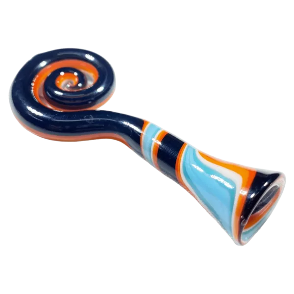 A glass pipe with a curved blue/orange/white swirled design, made of glass and sitting on a green surface. Jem Glass.