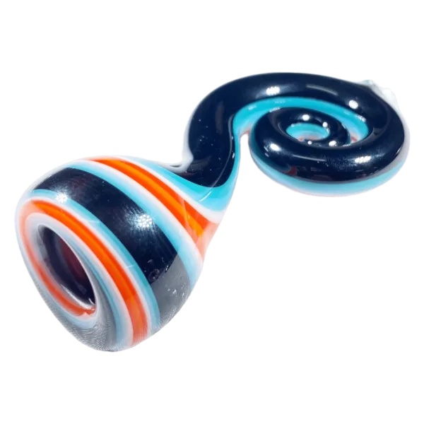 Jem Glass Curly Bats glass pipe with blue, orange, and white stripes, curved shape and made of glass, sitting on a green surface.