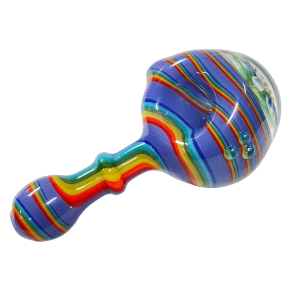 Playful, whimsical glass pipe with long curved handle and small round base. Multicolored rainbow pattern and bright handle make for a colorful and eye-catching design.
