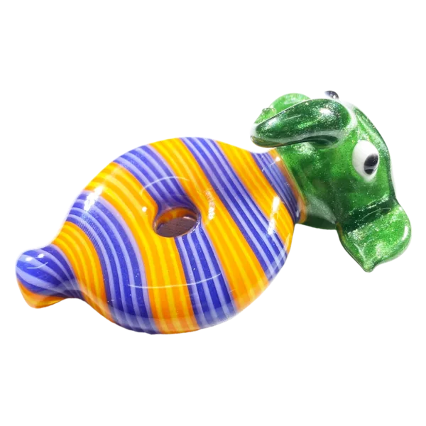 Colorful, striped fish-shaped toy with yellow and blue body, green fin, and yellow and blue tail. Blue eyes and open mouth. Sitting on a white surface.