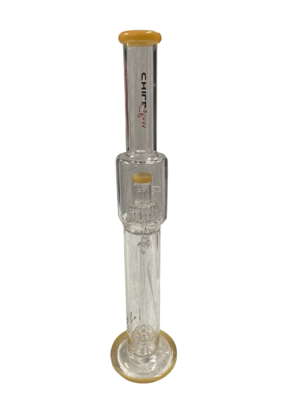 Clear glass bong with yellow base and small stem. Large round base with small bowl and circular holes in stem and base.