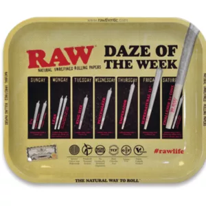 Metal tray with tools (scissors, tweezers, pliers) on black background with white Daze of the Week label. Promotional item for personal grooming/hygiene.