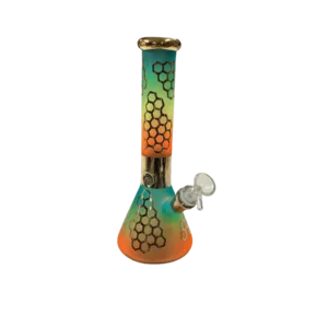 A colorful glass bong with a yellow, orange, and green honeycomb design on the bowl and a clear glass base and stem.