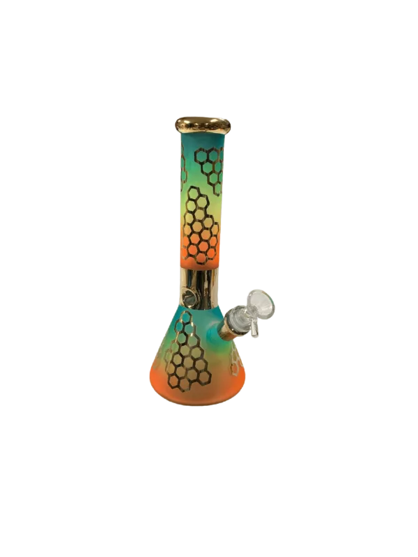 A colorful glass bong with a yellow, orange, and green honeycomb design on the bowl and a clear glass base and stem.