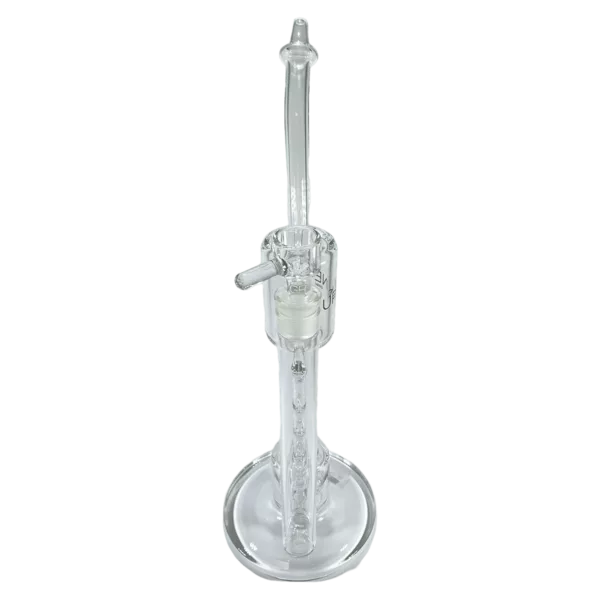 Clear glass vase with metal base and handle, standing on metal stand. Round shape, transparent, not filled with objects.
