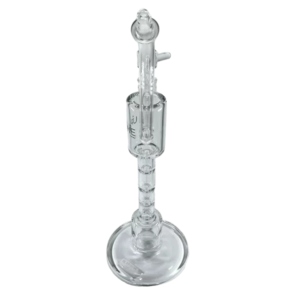 The Upline Water Pipe by GRAV is a clear glass vase with a long, curved stem and a small base. It stands on a pedestal with a round base and a small foot. The vase is transparent and has a smooth surface. The stem is curved and has a small knob at the top. The base of the vase is small and round.