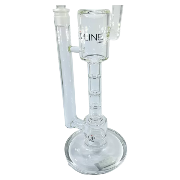 A clear glass bong with a clear stem and base, featuring two bowls connected by a stem and sitting on a clear base with a small hole in the center.